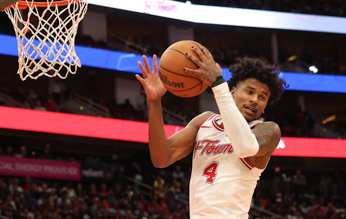 Rockets guard Jalen Green grabs a defensive rebound in the second half at Toyota Center.